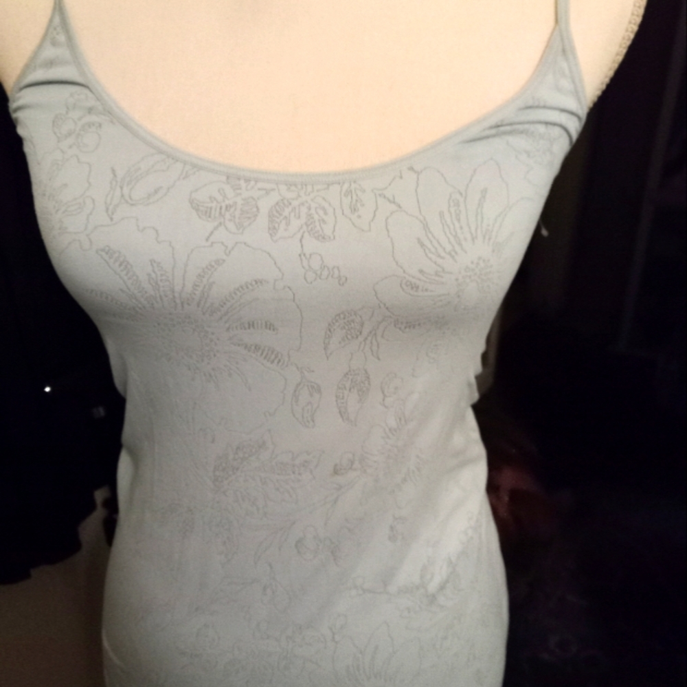 Used,not new,never worn stretch light blue floral design stretch camisole size l